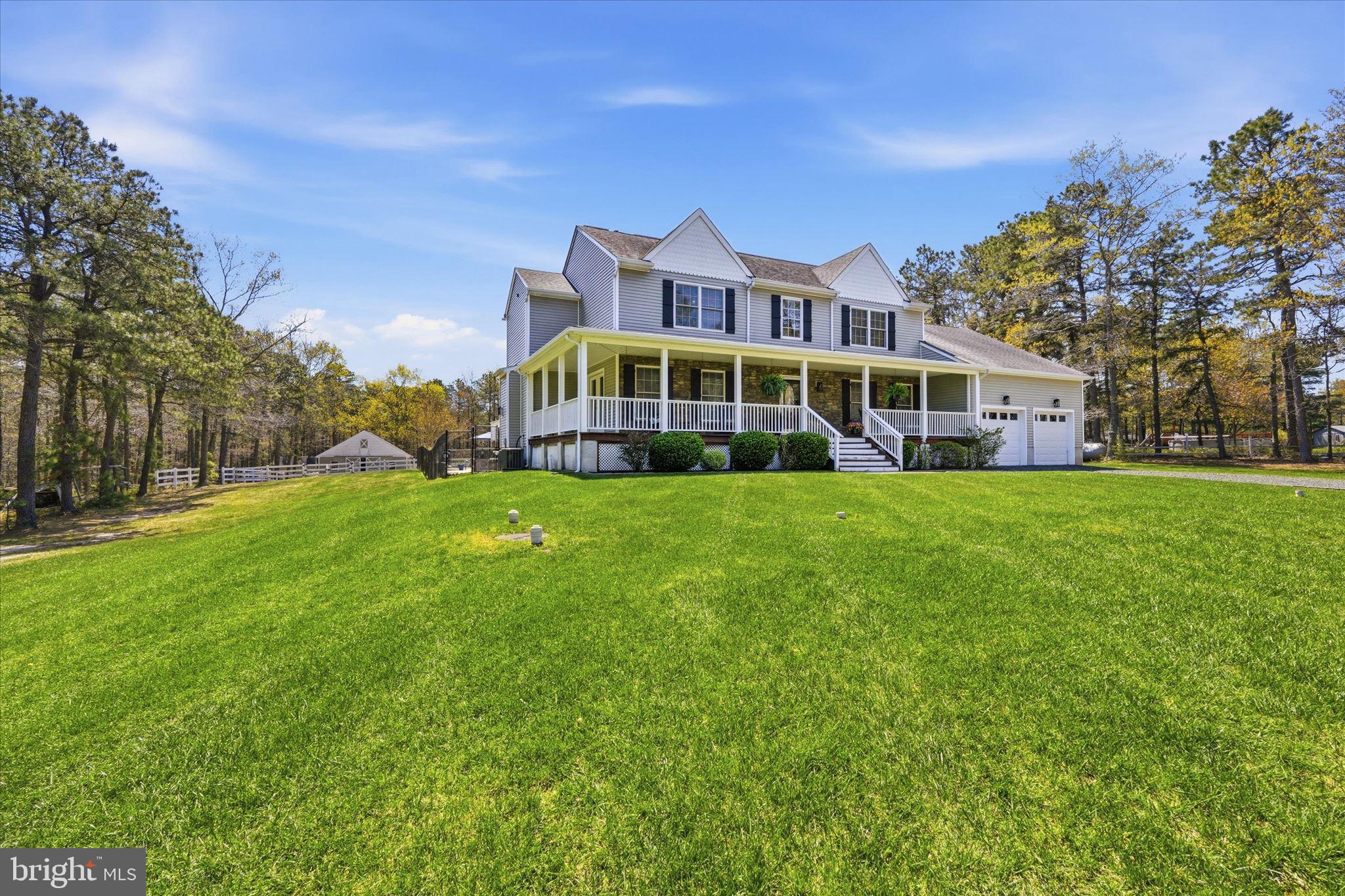 176 Warren Grove Road Barnegat, NJ 08005 - Photo 5 of 71 a view of a house with a big yard and large trees