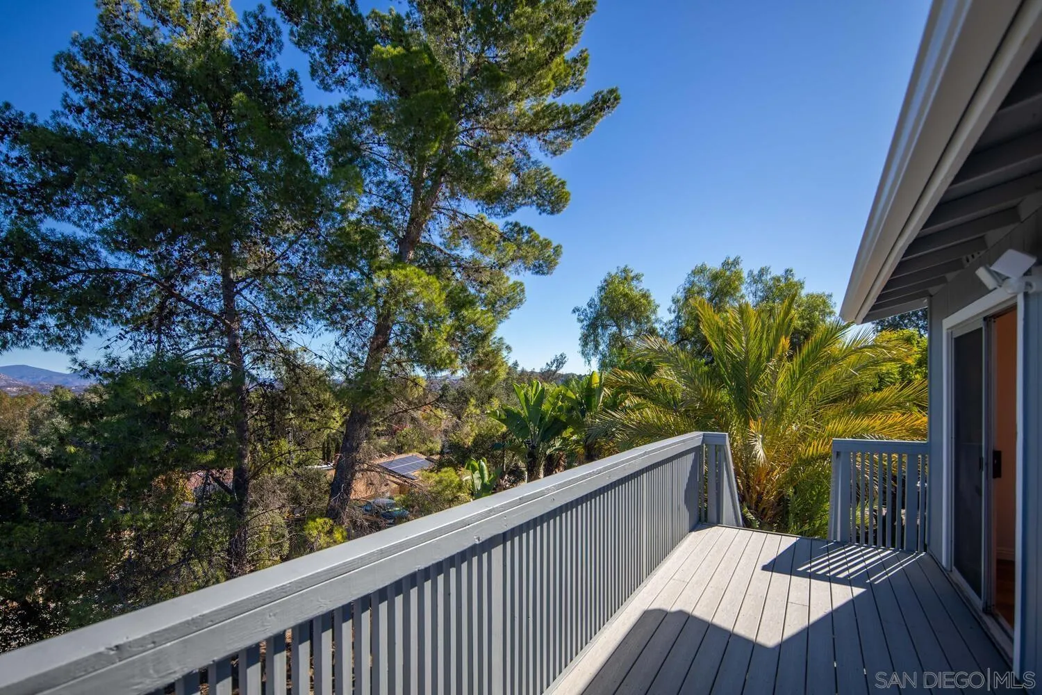 18435 Chablis Road Ramona, CA 92065 - Photo 17 of 49 a view of a balcony with wooden floor