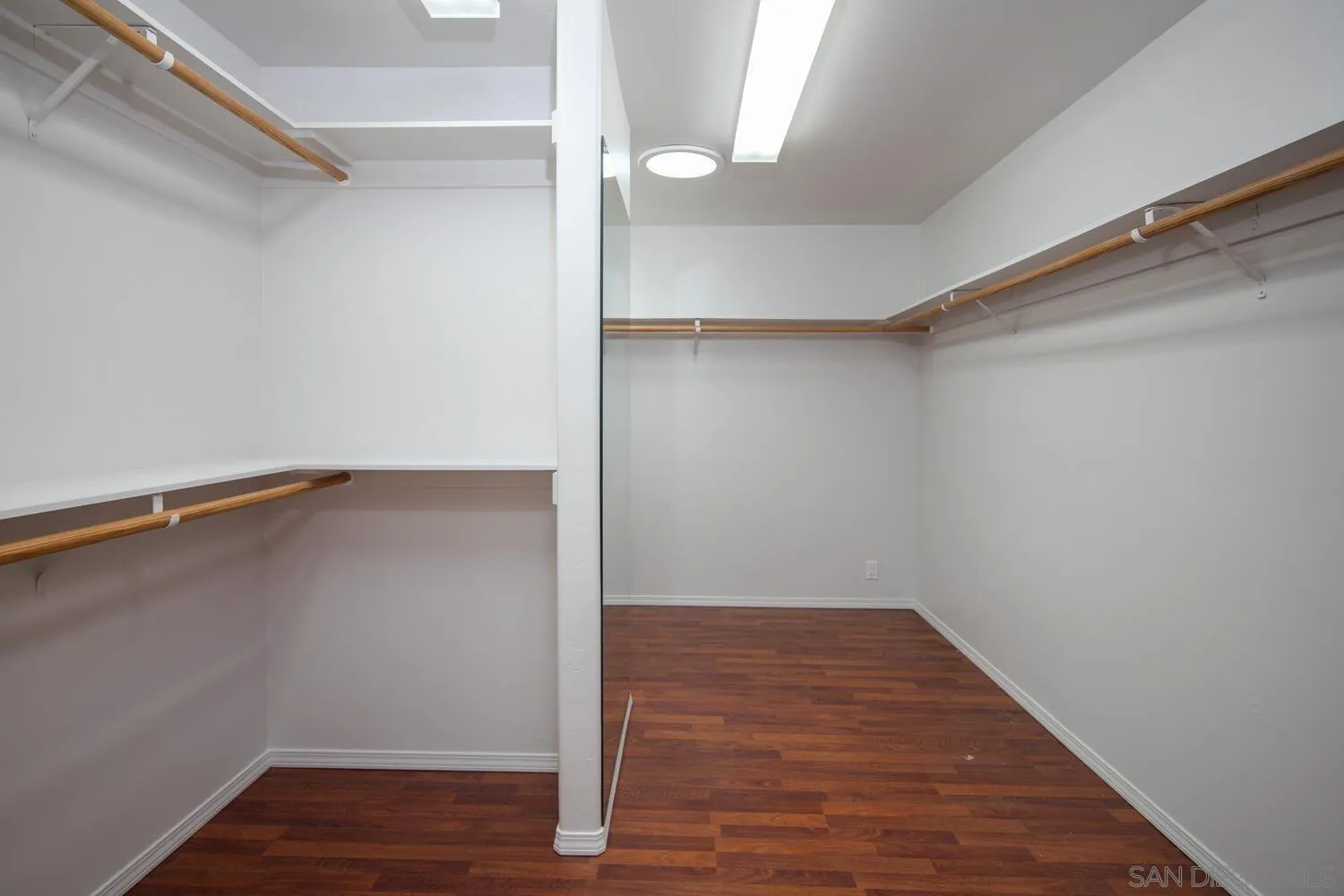 18435 Chablis Road Ramona, CA 92065 - Photo 22 of 49 a view of an empty room with wooden floor