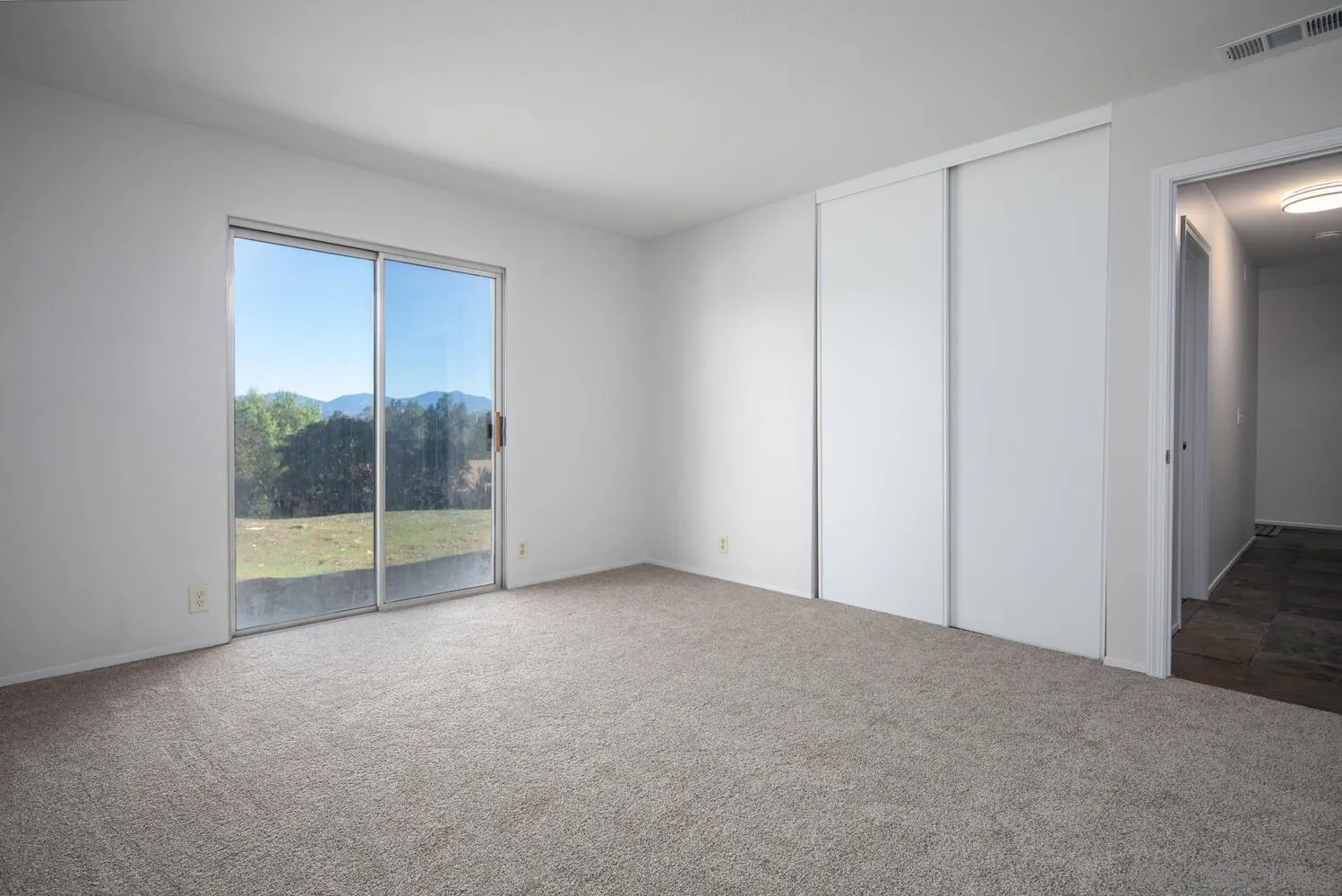 18435 Chablis Road Ramona, CA 92065 - Photo 25 of 49 a view of an empty room with glass door