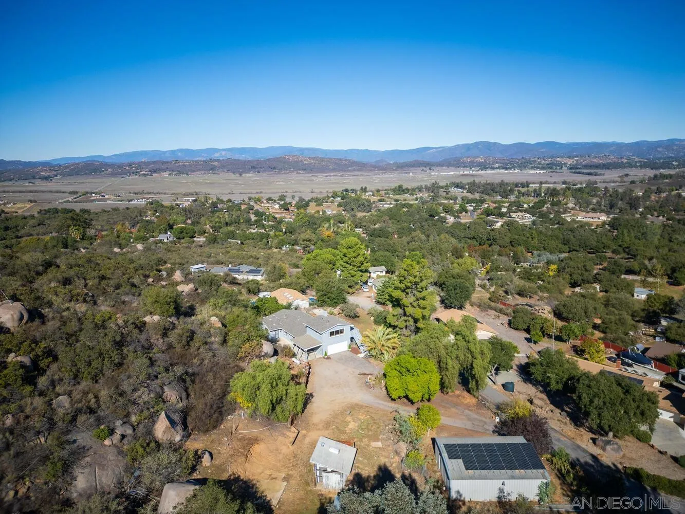 18435 Chablis Road Ramona, CA 92065 - Photo 49 of 49 an aerial view of a city with lots of residential buildings