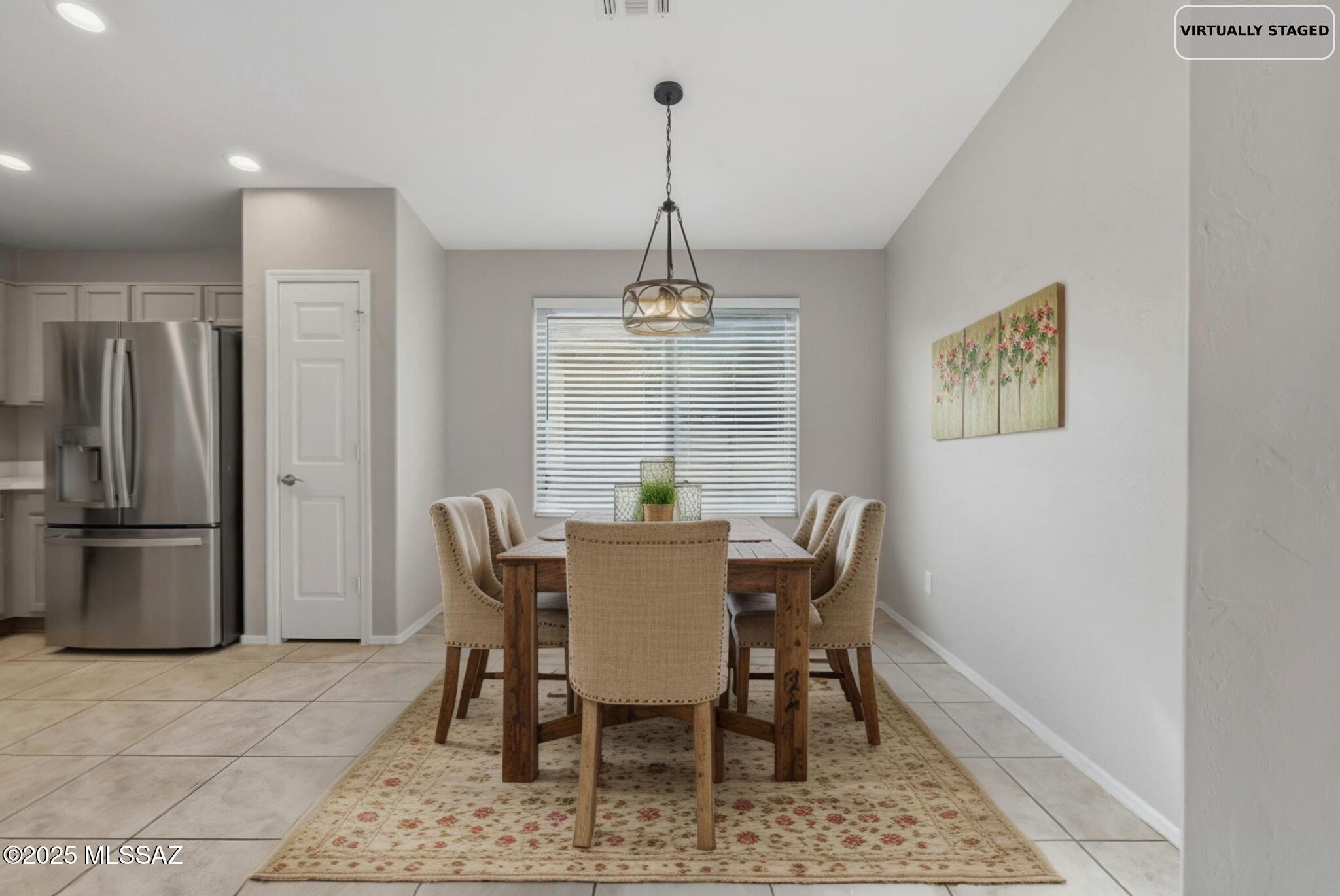 8244 South Lost Mountain Road Tucson, AZ 85747 - Photo 13 of 41 a view of a dining room with furniture window and wooden floor