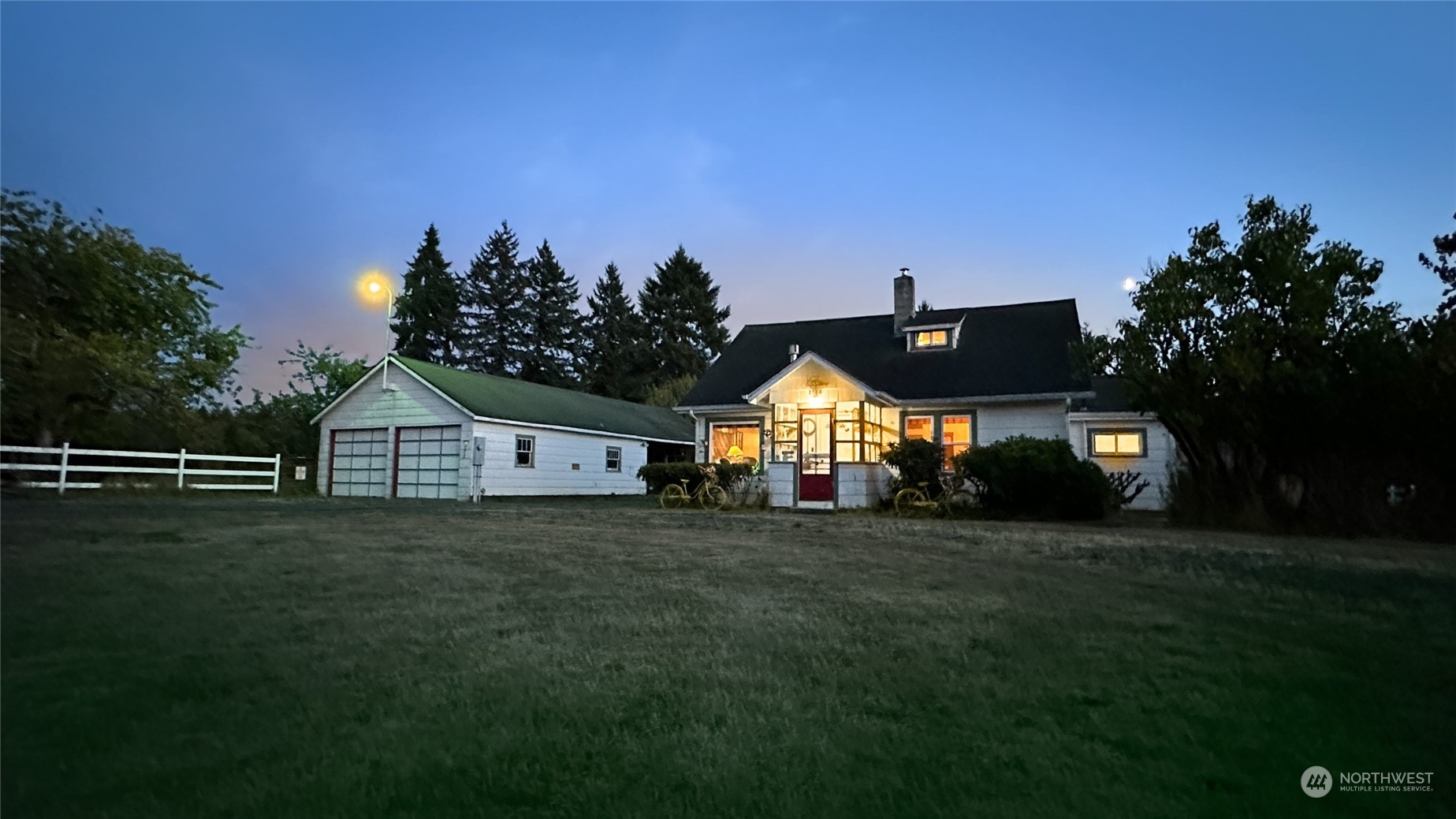 1146 Koontz Road Chehalis, WA 98532 - Photo 2 of 39 a front view of a house with a garden