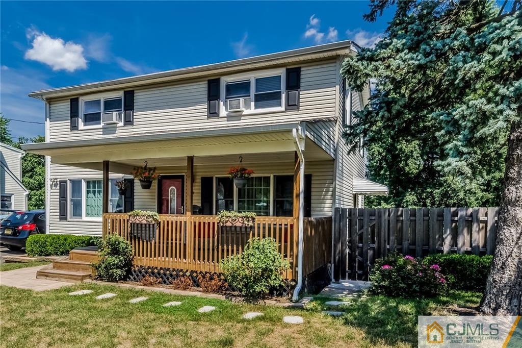 34 Wilcox Road New Brunswick, NJ 08901 - Photo 1 of 24 front view of a house with a yard