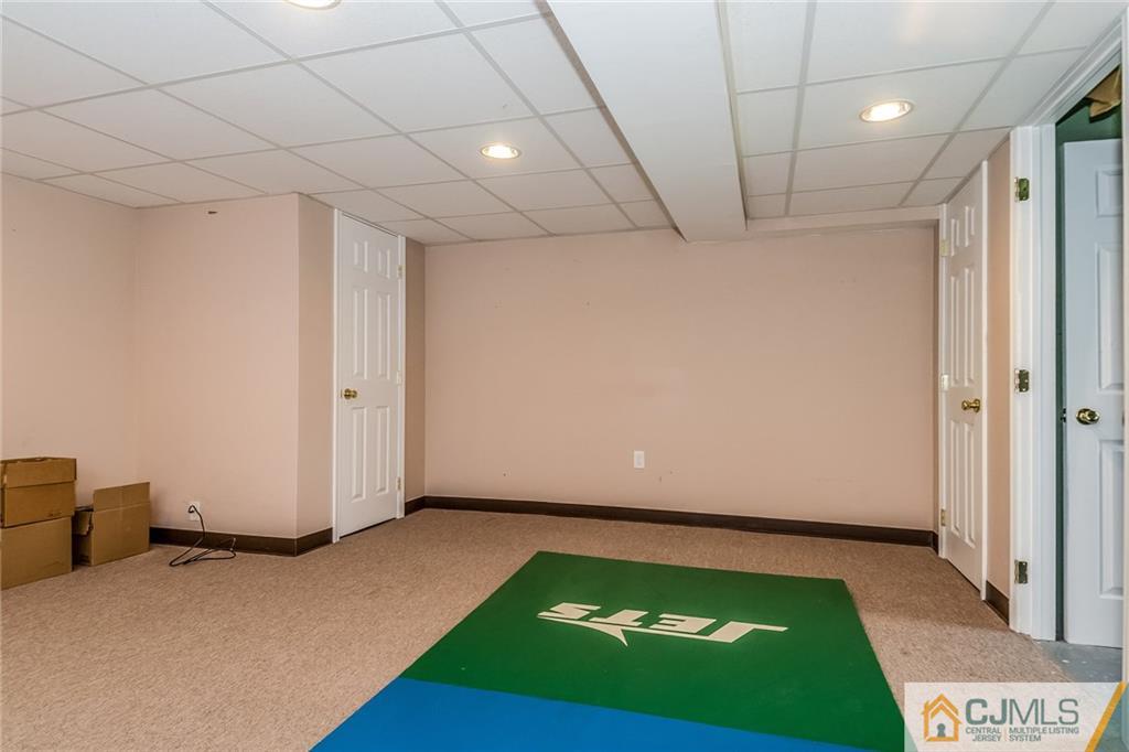 34 Wilcox Road New Brunswick, NJ 08901 - Photo 17 of 24 a view of an empty room with a rug