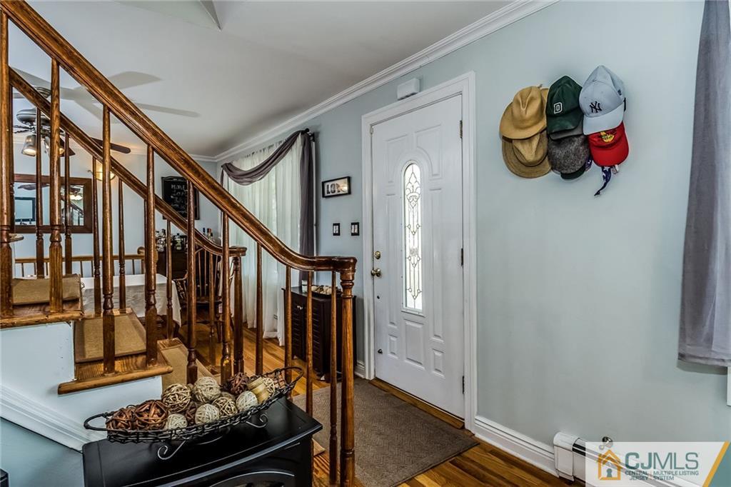 34 Wilcox Road New Brunswick, NJ 08901 - Photo 3 of 24 a view of an entryway with wooden floor