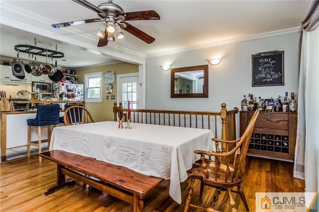 34 Wilcox Road New Brunswick, NJ 08901 - Photo 7 of 24 a bedroom with furniture and wooden floor