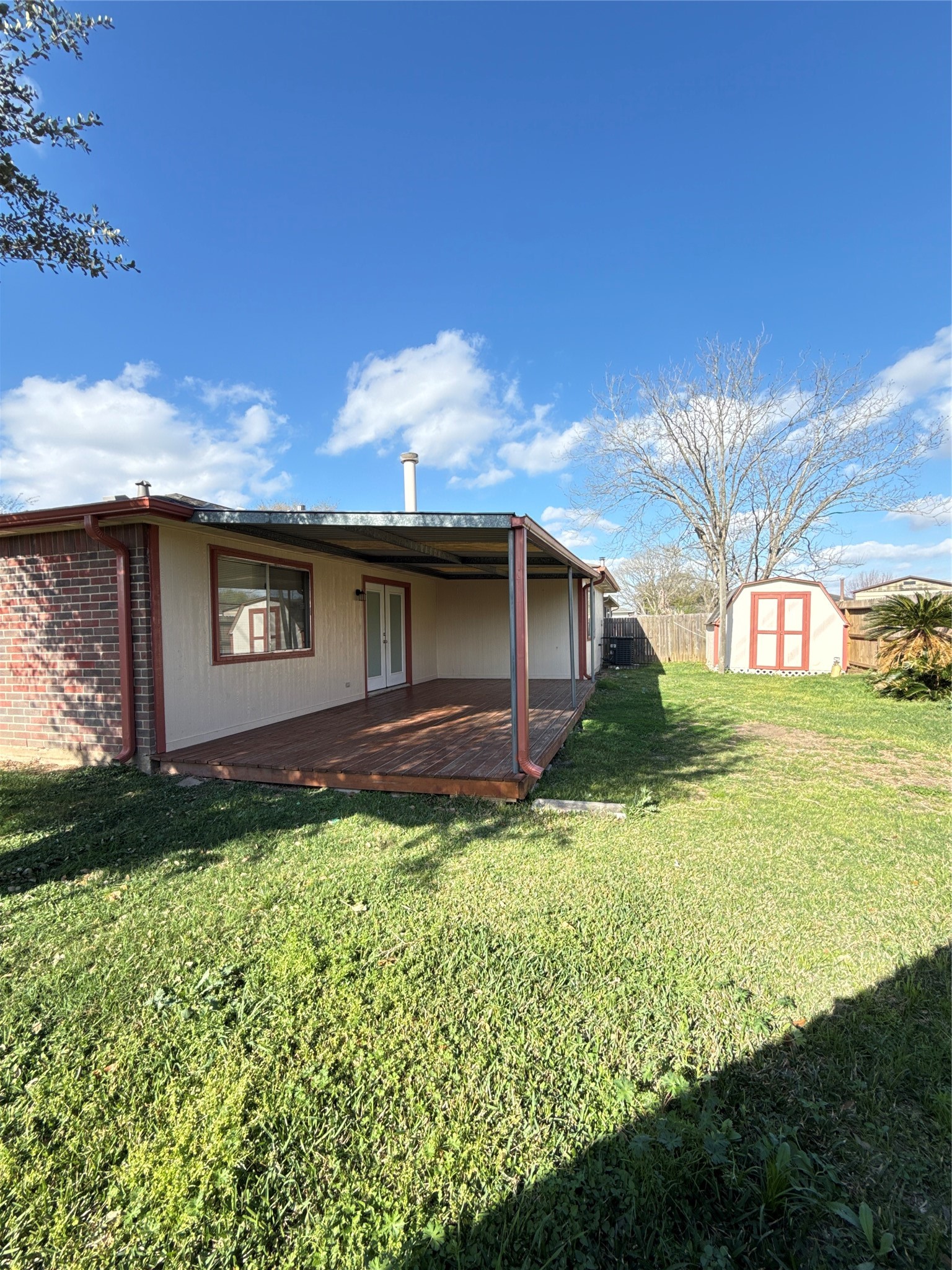 15919 Hiram Clarke Road Houston, TX 77053 - Photo 29 of 29 a view of a house with backyard and garden