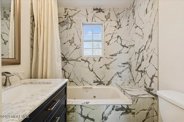 a picture of a park with a bench