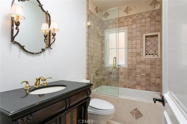 a bedroom with a bed and a walk in closet