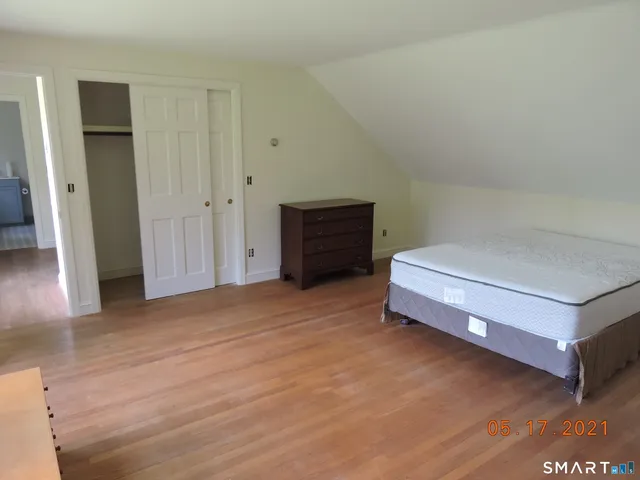 a bathroom with a toilet a sink and bathtub