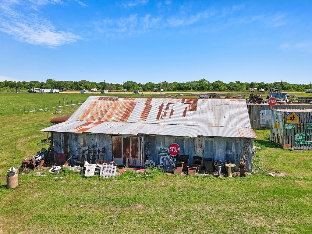 3547 Highway 237 Round Top, TX 78954 - Photo 6 of 7 a view of an house with backyard space and balcony
