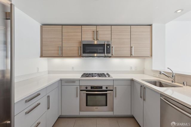 a view of a livingroom with wooden floor
