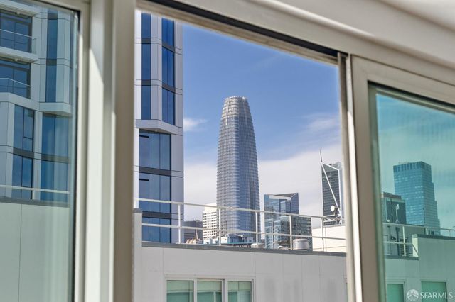 a view of a balcony and next to a window