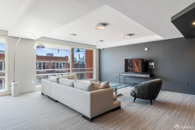 a kitchen with a sink cabinets and window
