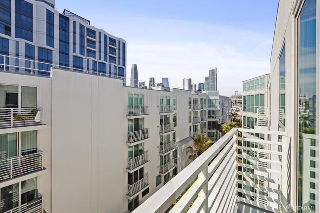 a view of a city with tall buildings