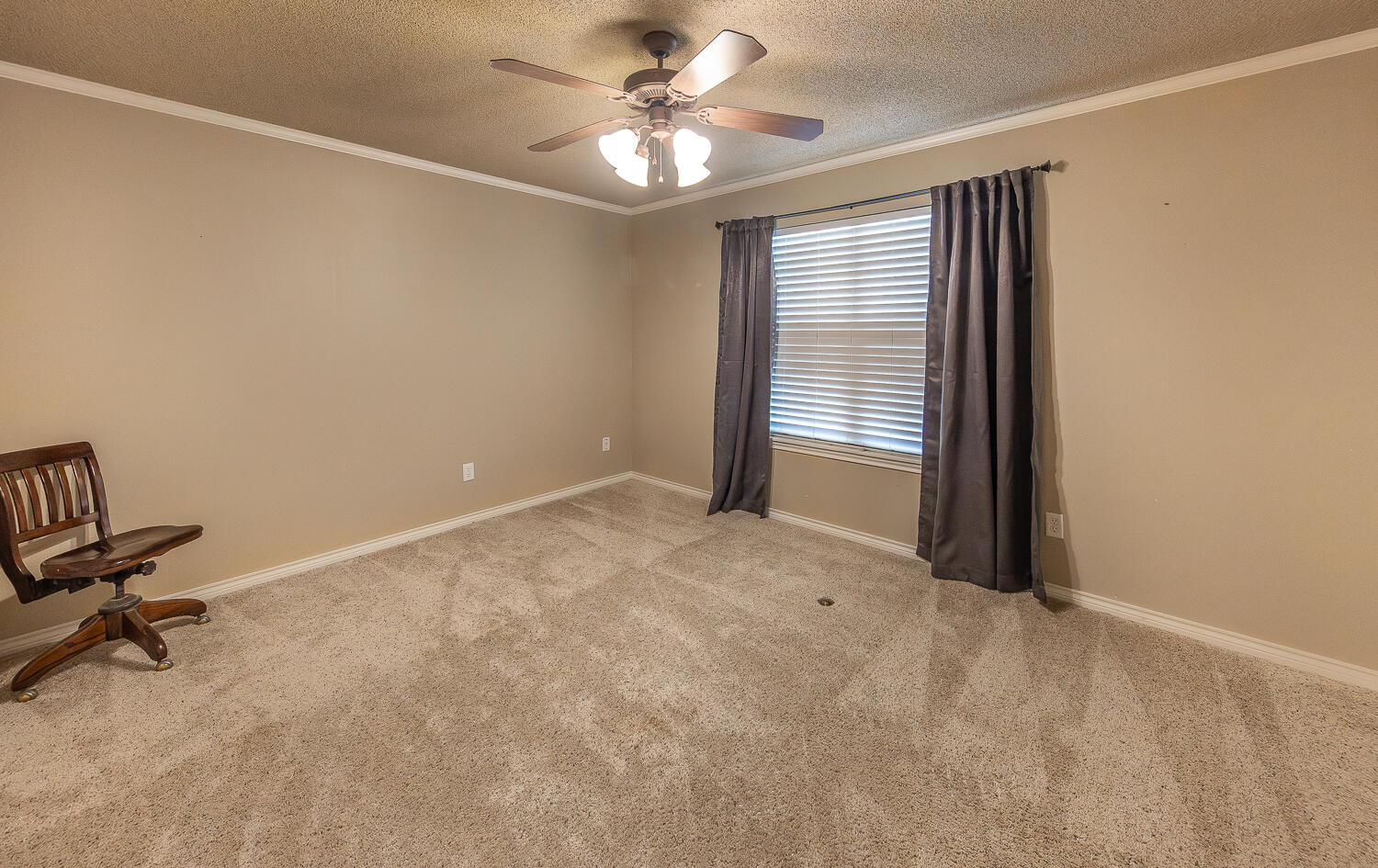 6309 County Road 7470 Lubbock, TX 79424 - Photo 23 of 41 a view of an empty room with a window