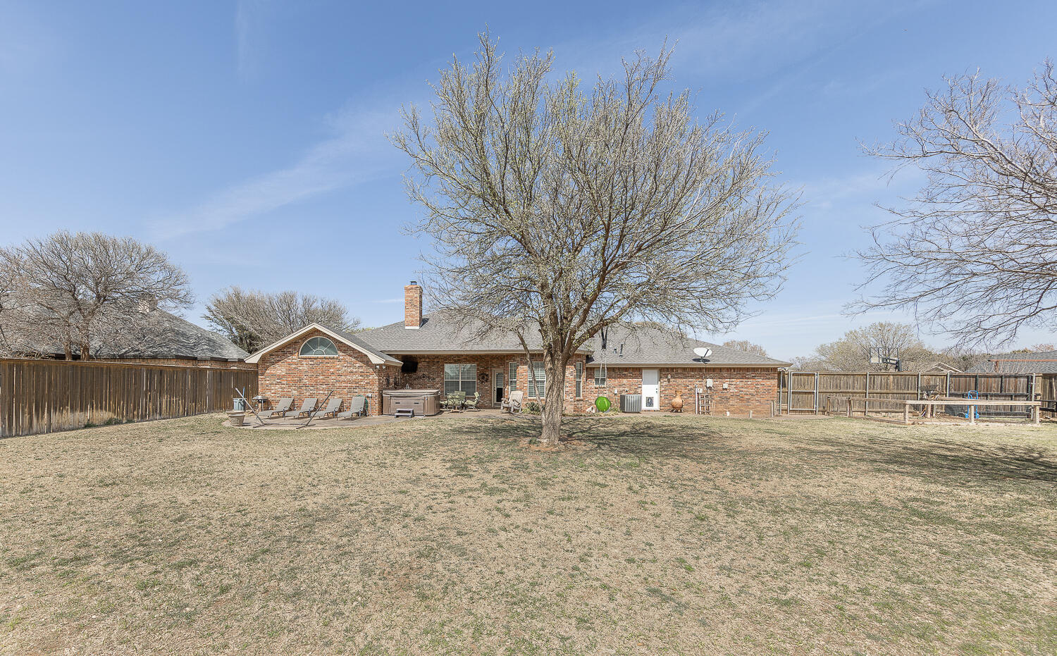 6309 County Road 7470 Lubbock, TX 79424 - Photo 32 of 41 a view of a house with a yard