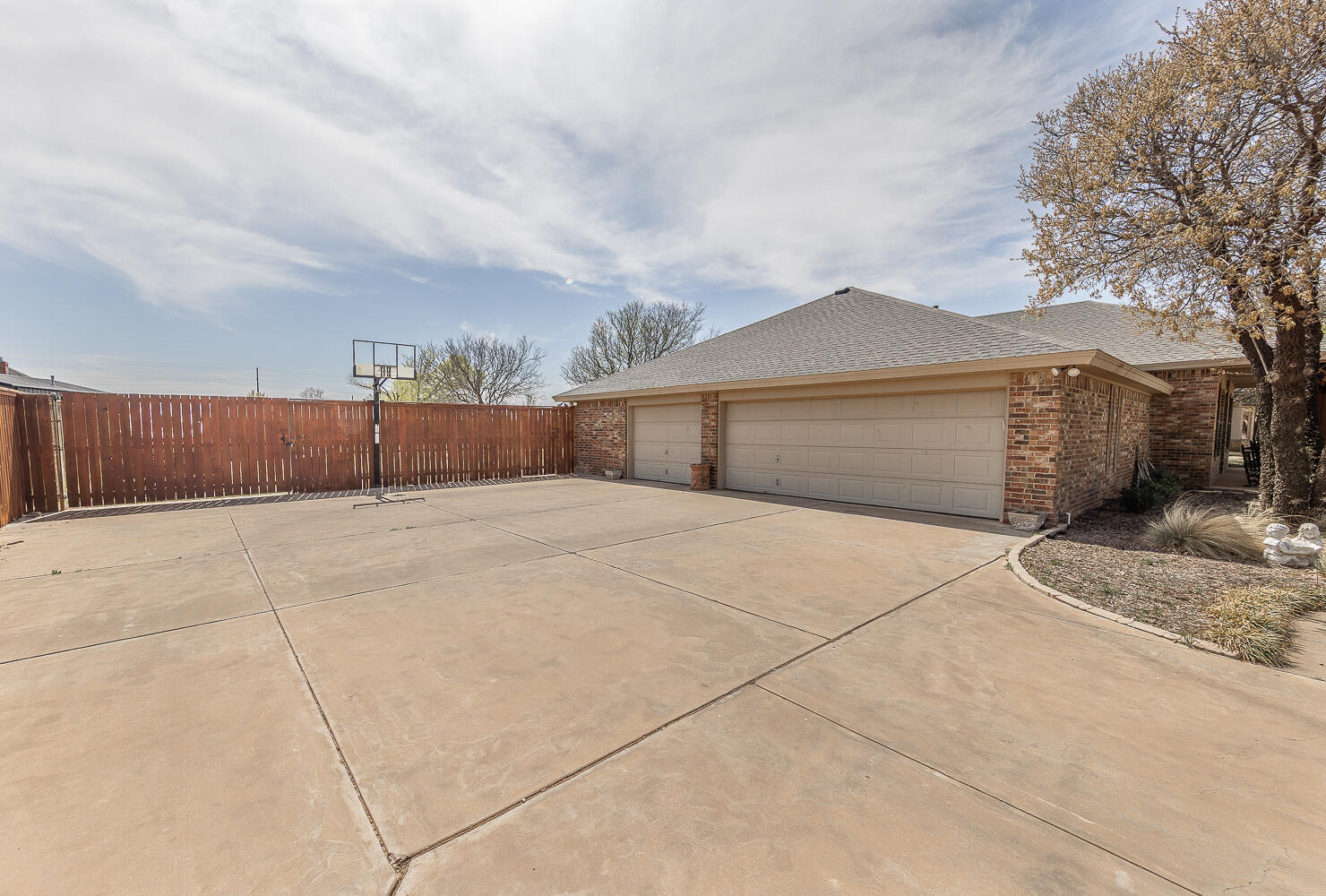 6309 County Road 7470 Lubbock, TX 79424 - Photo 37 of 41 a view of a house with a yard