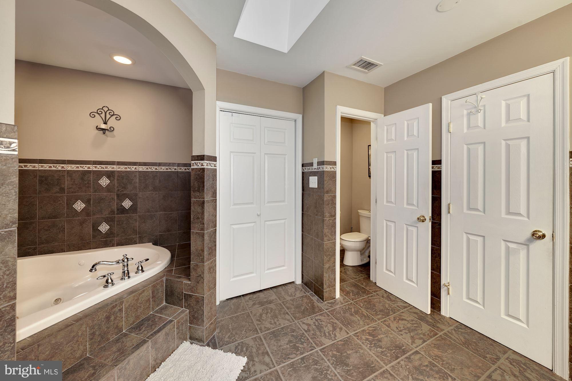 5 Middlebridge Court Silver Spring, MD 20906 - Photo 22 of 43 Linen closet and separate toilet room, skylight