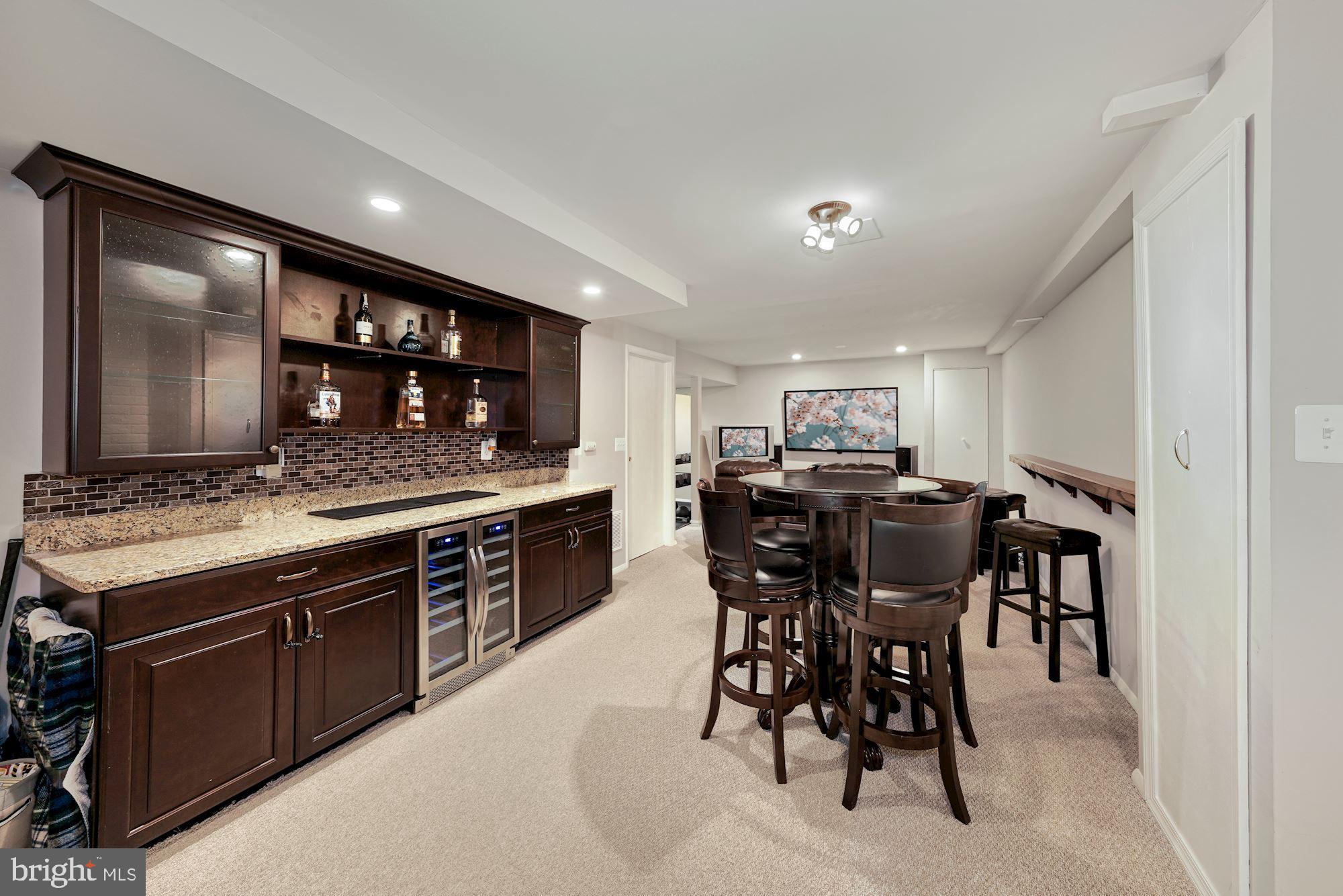 5 Middlebridge Court Silver Spring, MD 20906 - Photo 32 of 43 Basement with custom bar and wine cooler