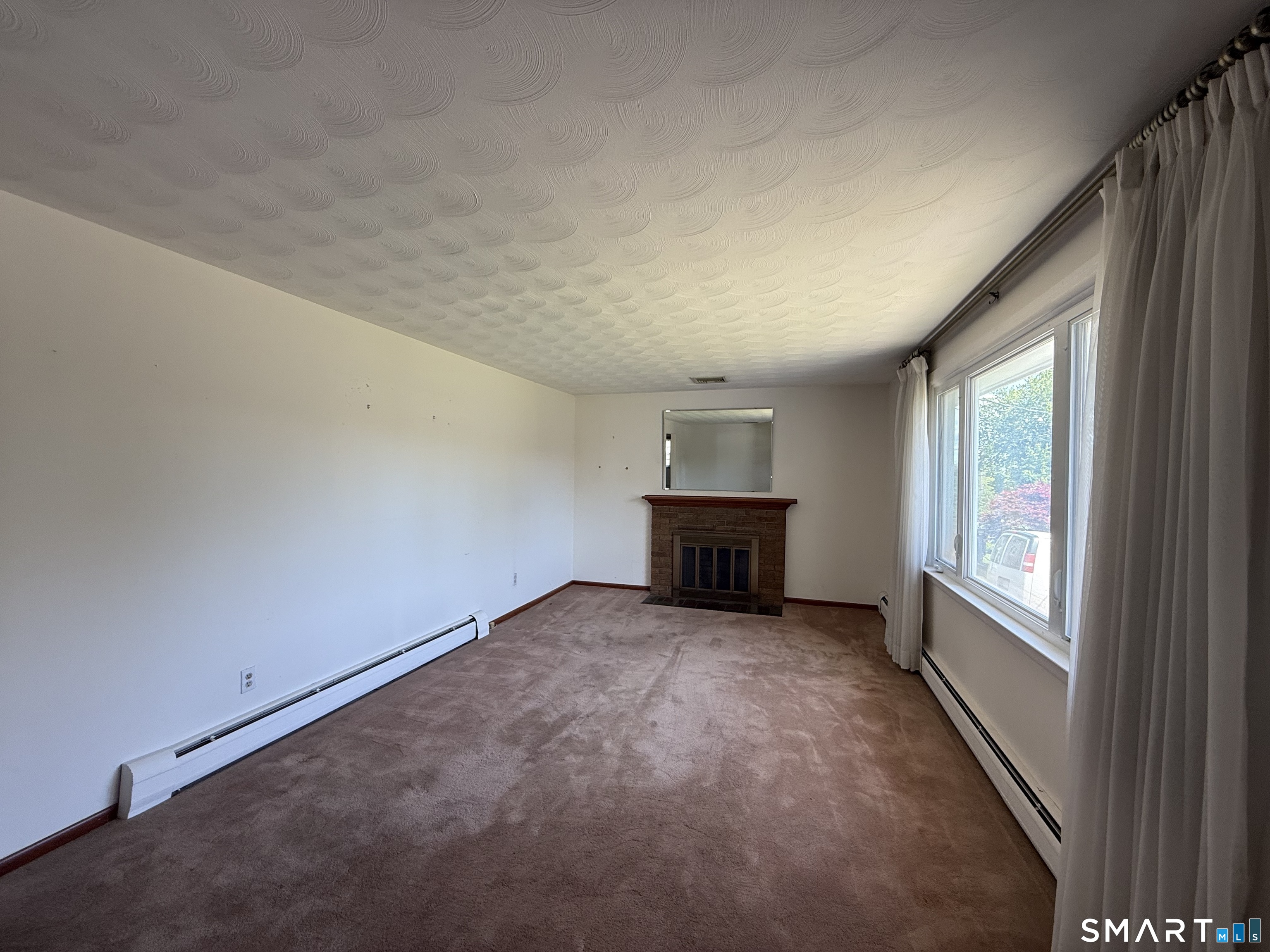 26 Maple Street Trumbull, CT 06611 - Photo 21 of 37 an empty room with windows