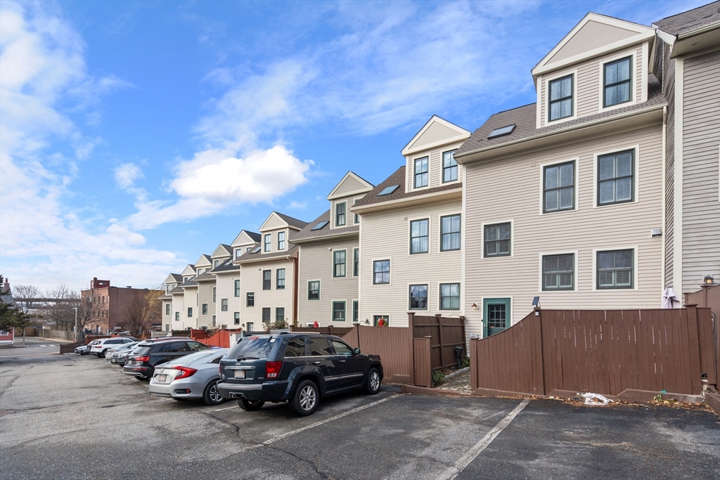 19 Charles Street Boston, MA 02129 - Photo 26 of 28 a view of a cars park in front of a building