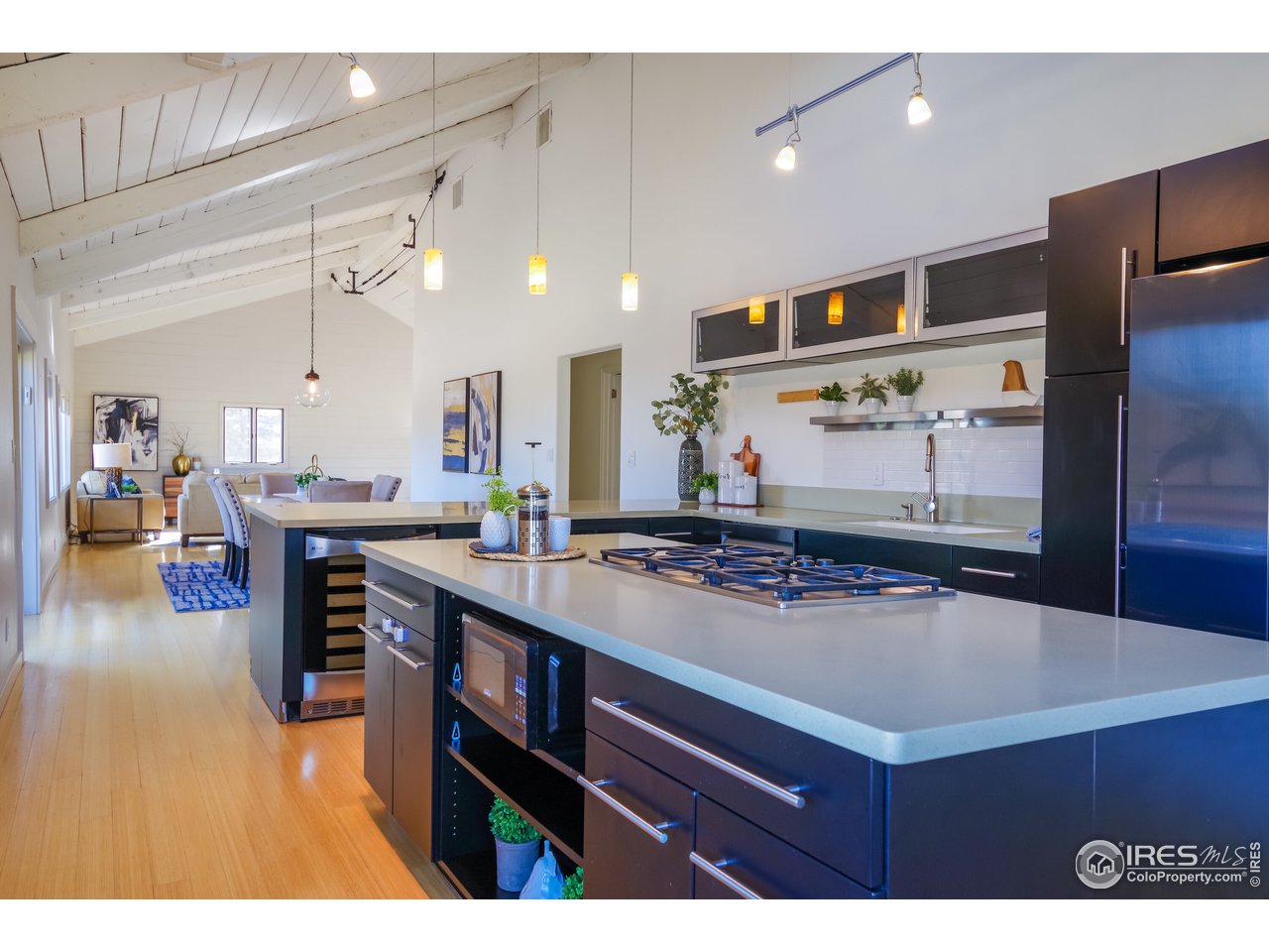 8324 West Fork Road Boulder, CO 80302 - Photo 38 of 38 a kitchen with stainless steel appliances granite countertop a sink a stove and a refrigerator