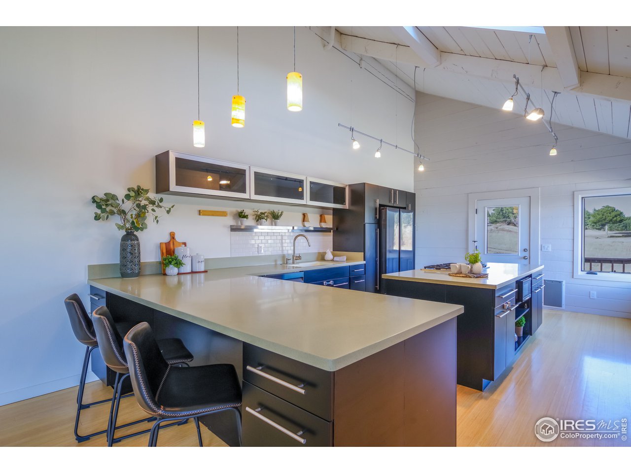 8324 West Fork Road Boulder, CO 80302 - Photo 13 of 38 a view of a dining room with furniture