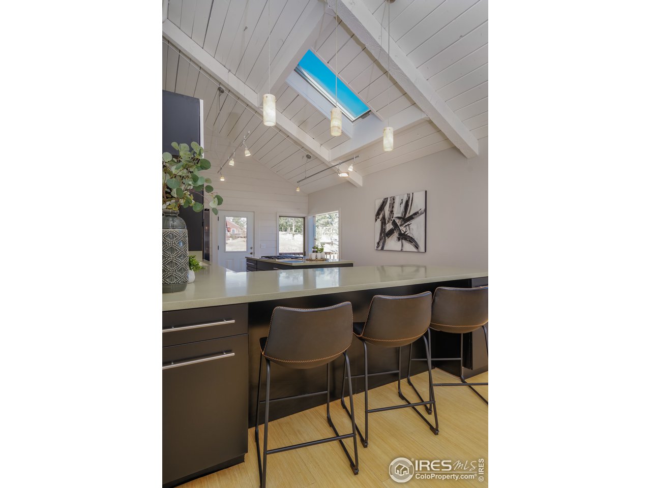 8324 West Fork Road Boulder, CO 80302 - Photo 14 of 38 a table and chairs in a room