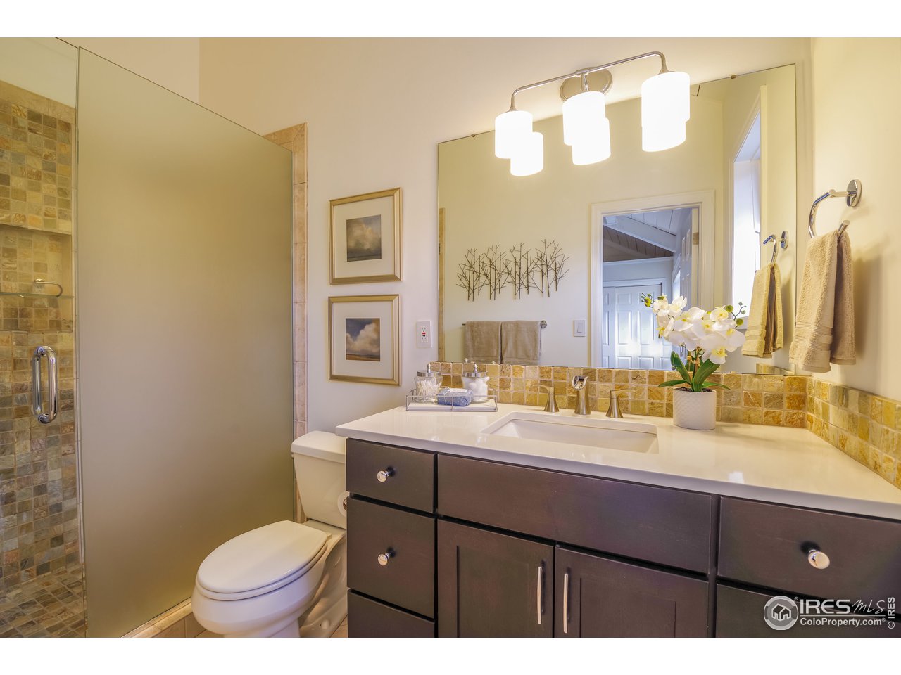 8324 West Fork Road Boulder, CO 80302 - Photo 18 of 38 a bathroom with a sink and a mirror