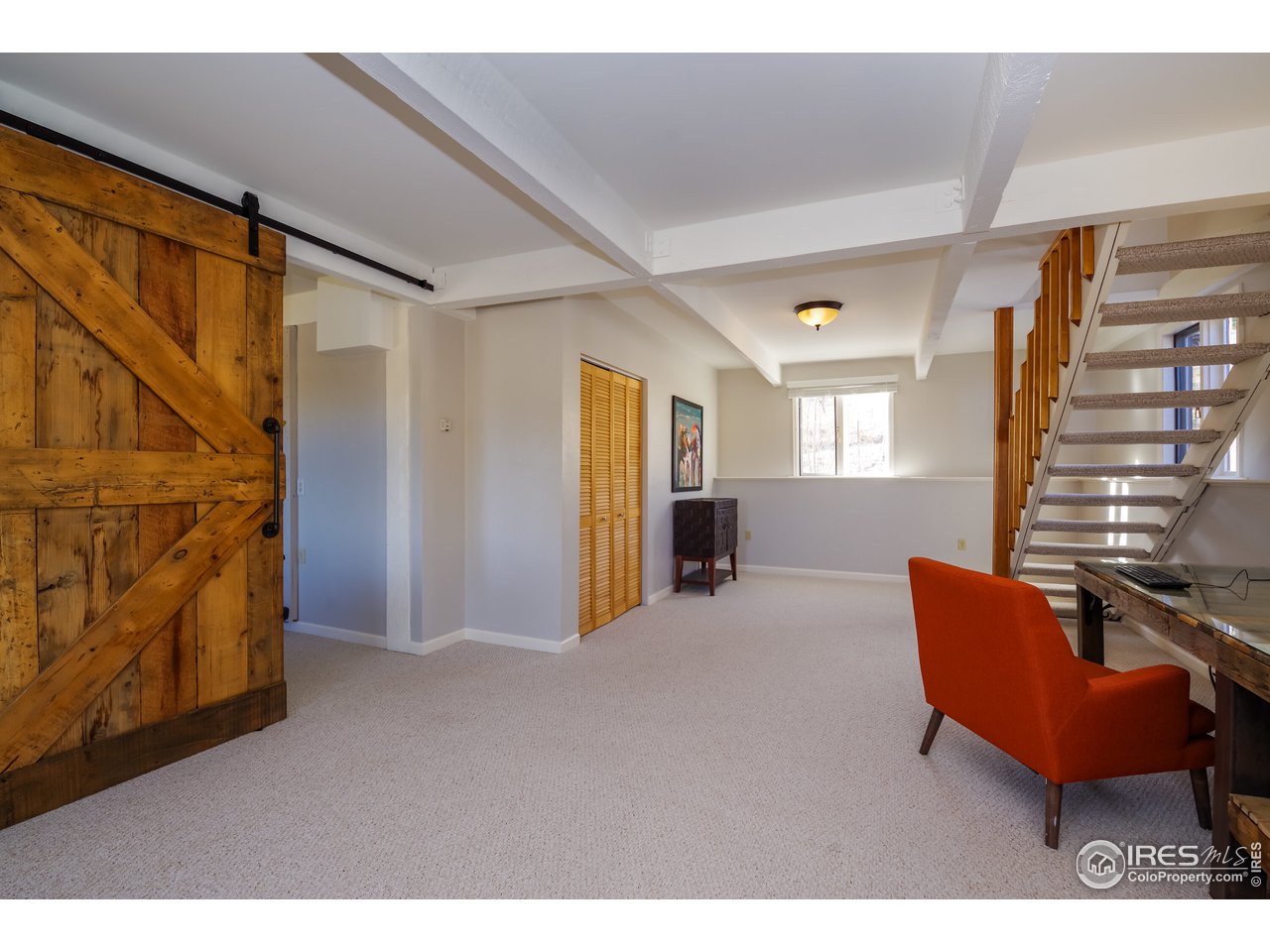 8324 West Fork Road Boulder, CO 80302 - Photo 23 of 38 a room with furniture and window