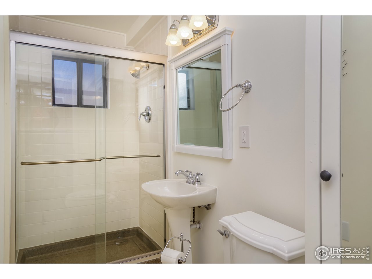8324 West Fork Road Boulder, CO 80302 - Photo 25 of 38 a bathroom with a sink toilet and shower