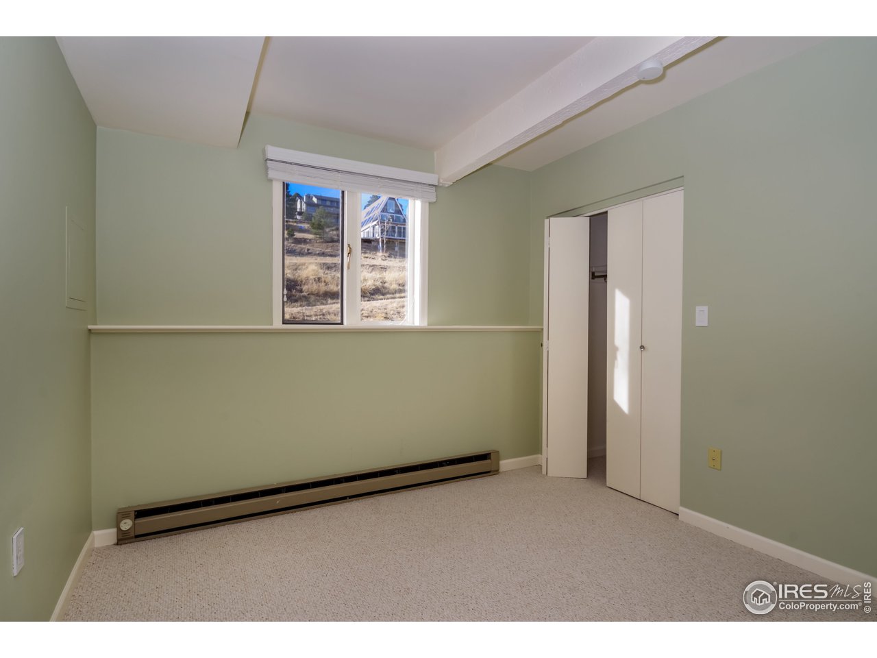 8324 West Fork Road Boulder, CO 80302 - Photo 26 of 38 a view of an empty room with a window