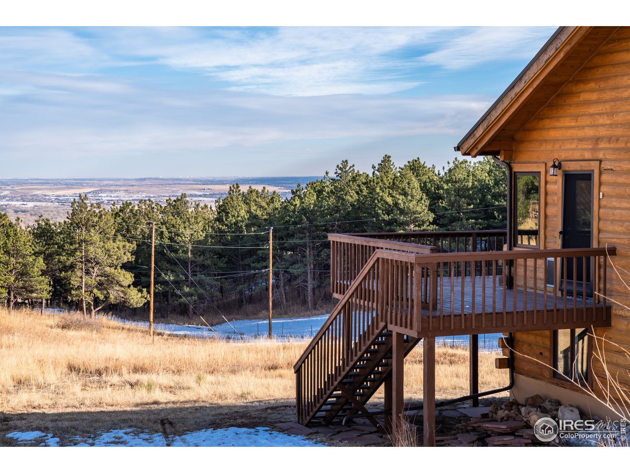 8324 West Fork Road Boulder, CO 80302 - Photo 29 of 38 a view of a chair and table on the terrace