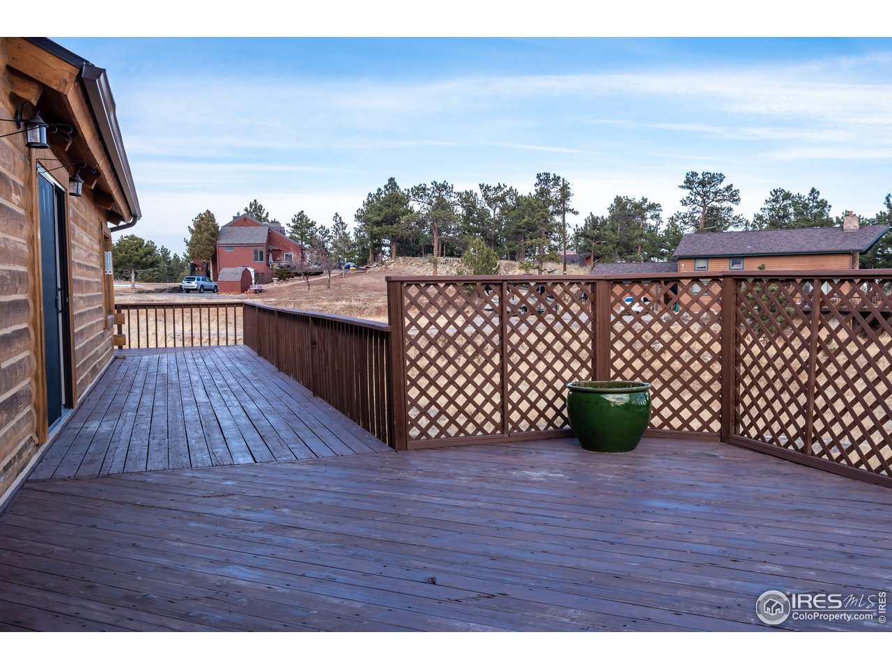 8324 West Fork Road Boulder, CO 80302 - Photo 31 of 38 a view of roof deck with wooden floor