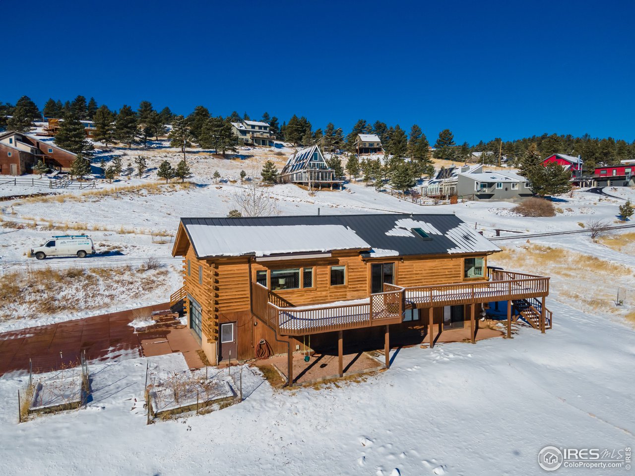 8324 West Fork Road Boulder, CO 80302 - Photo 35 of 38 a view of a terrace with chairs
