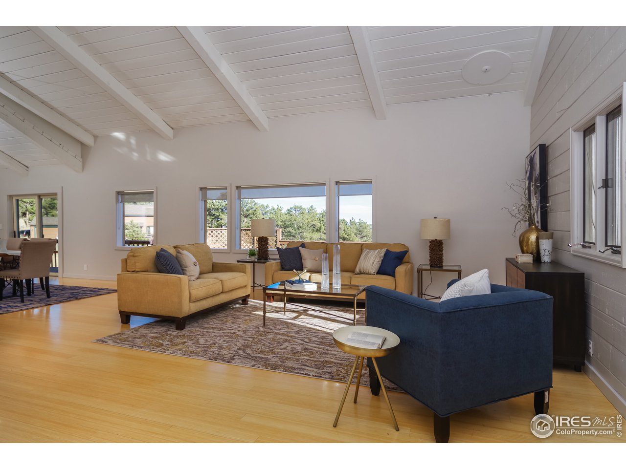 8324 West Fork Road Boulder, CO 80302 - Photo 6 of 38 a living room with furniture and a large window