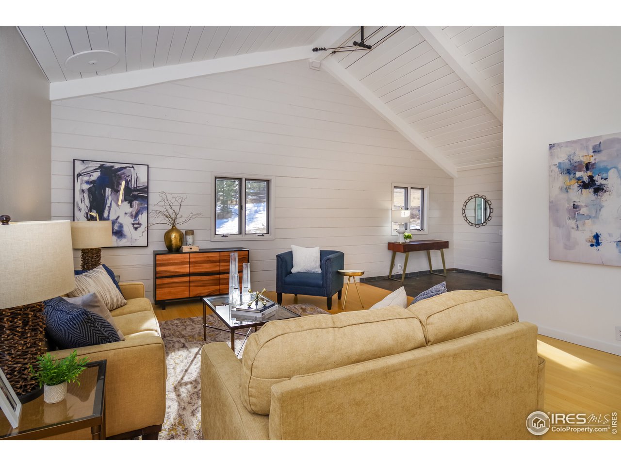8324 West Fork Road Boulder, CO 80302 - Photo 7 of 38 a living room with furniture and wooden floor