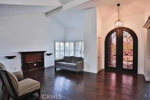 a view of an livingroom with furniture and staircase