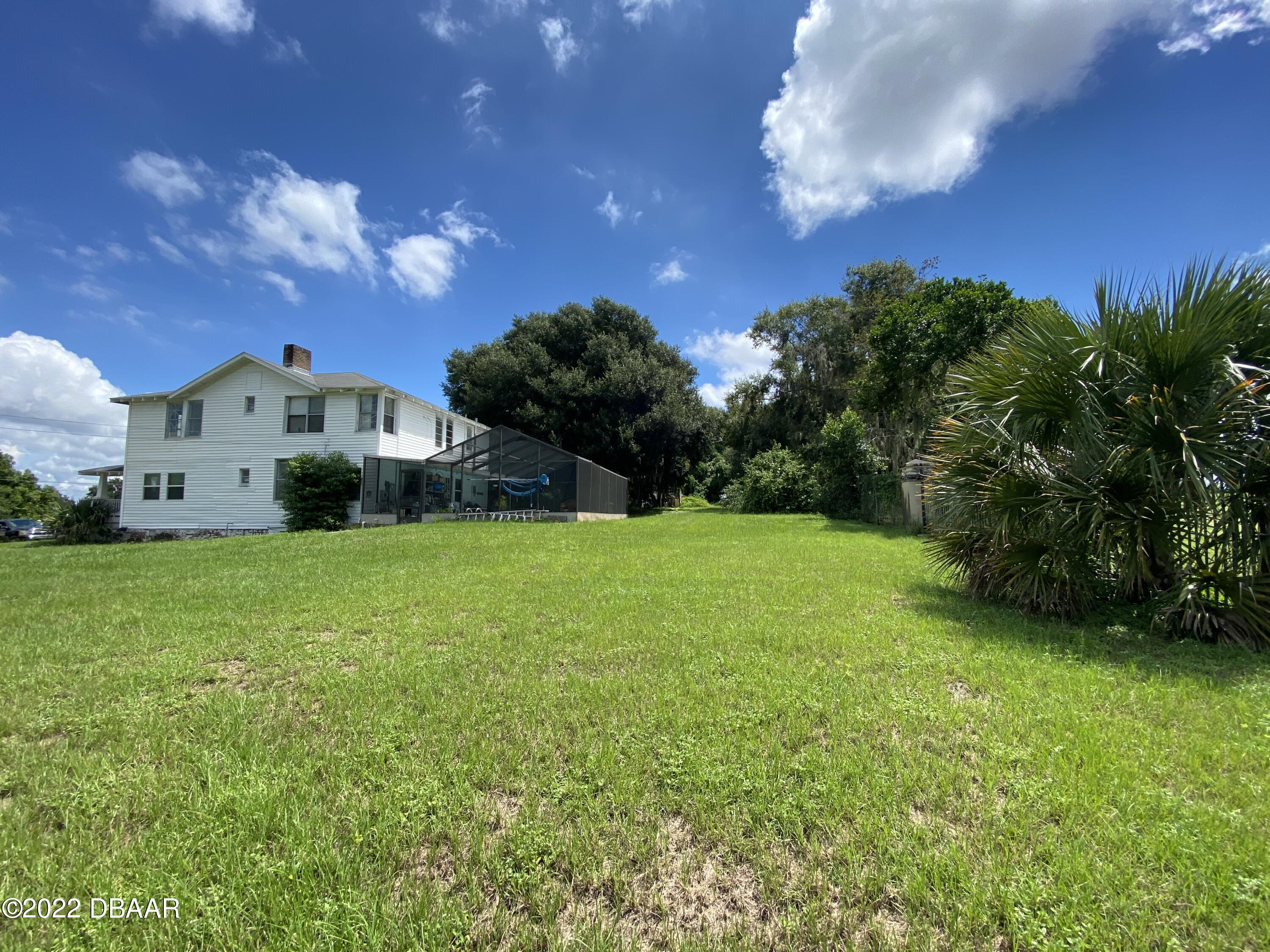 12116 Lane Park Road Tavares, FL 32778 - Photo 1 of 58 86D8085D-A8F6-4342-AC32-E31FAC811927