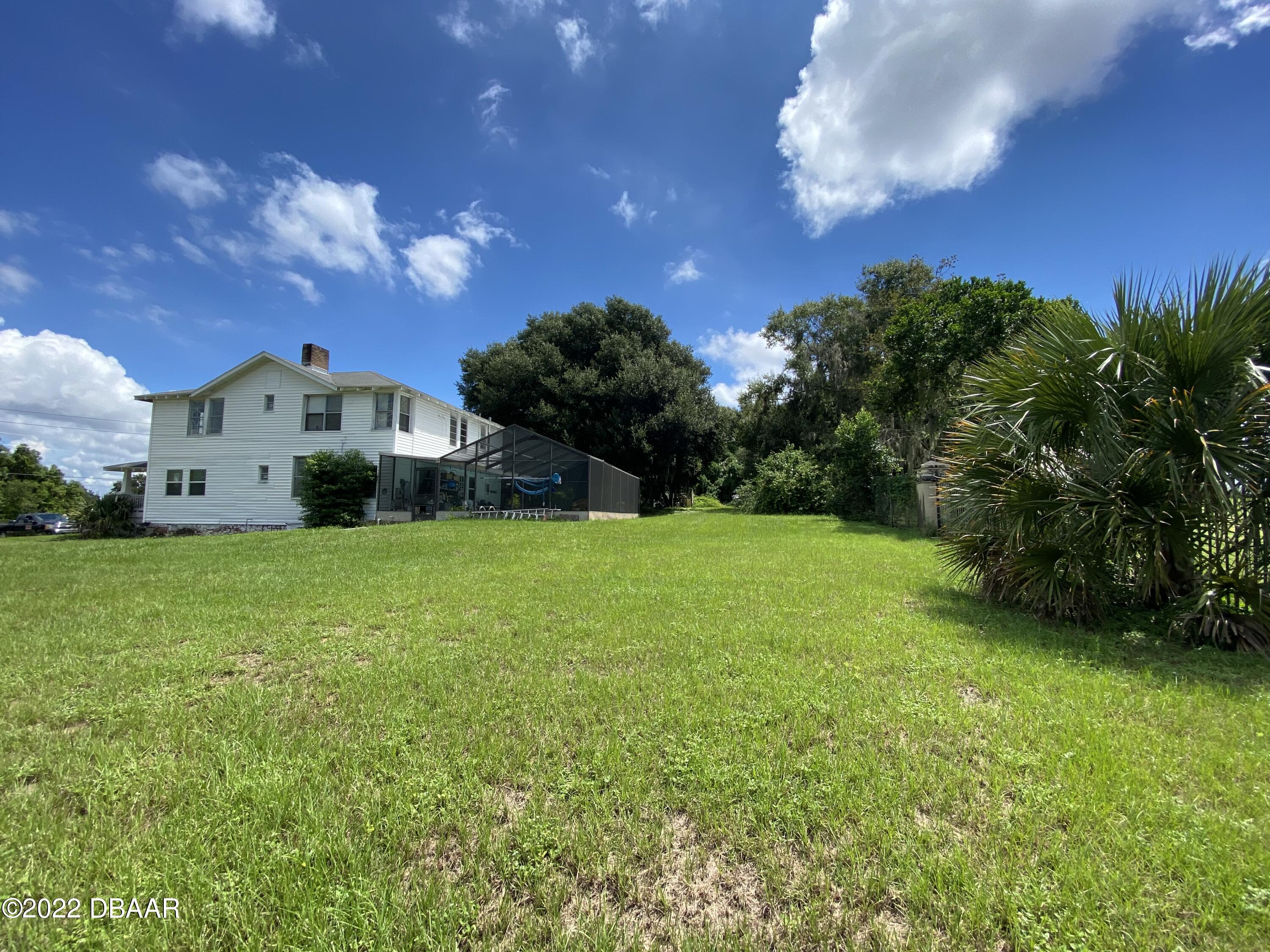 12116 Lane Park Road Tavares, FL 32778 - Photo 2 of 58 E78A3A9B-C54A-49CB-AD49-D87225A42A42