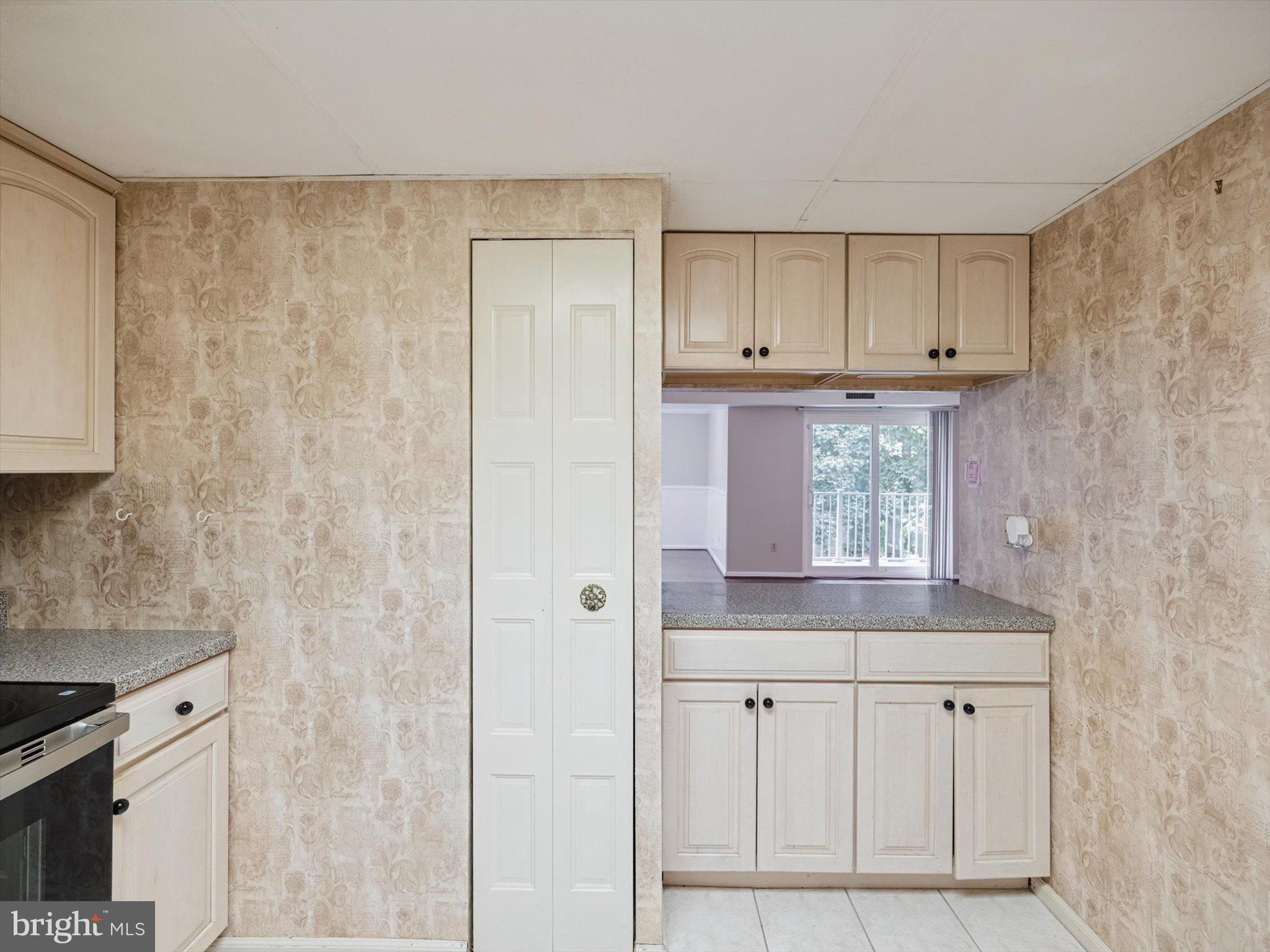 3204 Delaire Landing Road, Unit 3204 Philadelphia, PA 19114 - Photo 12 of 39 Kitchen with Opening to Living Room