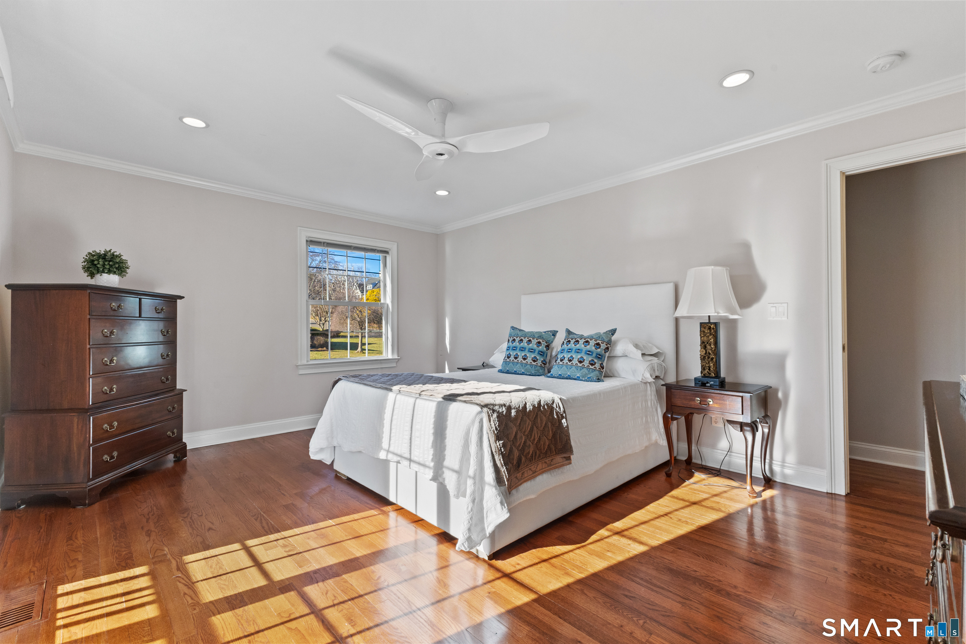 61 Hobson Street Stamford, CT 06902 - Photo 18 of 36 a bed room with a bed and a television