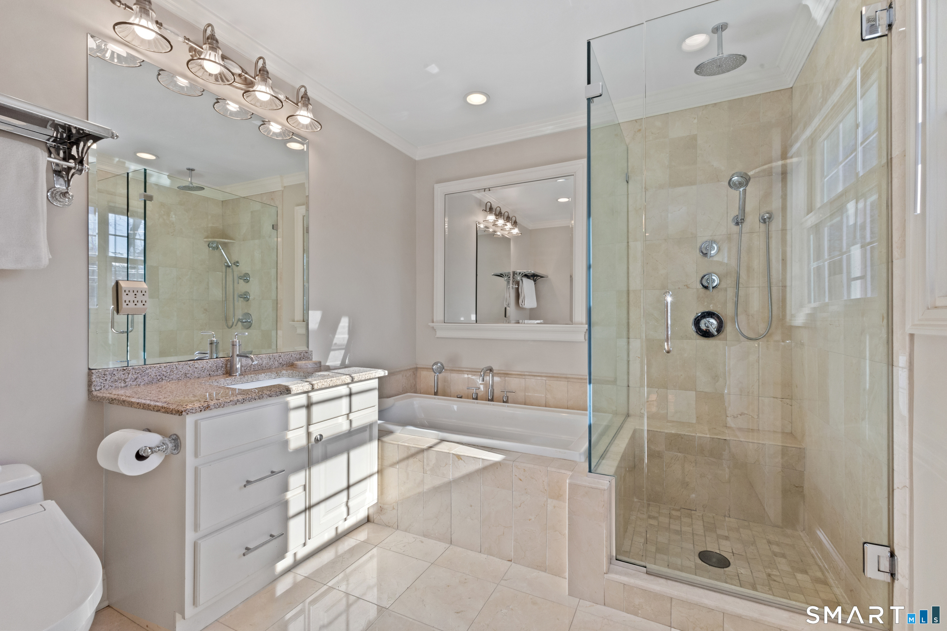 61 Hobson Street Stamford, CT 06902 - Photo 19 of 36 a bathroom with a double vanity sink mirror and shower