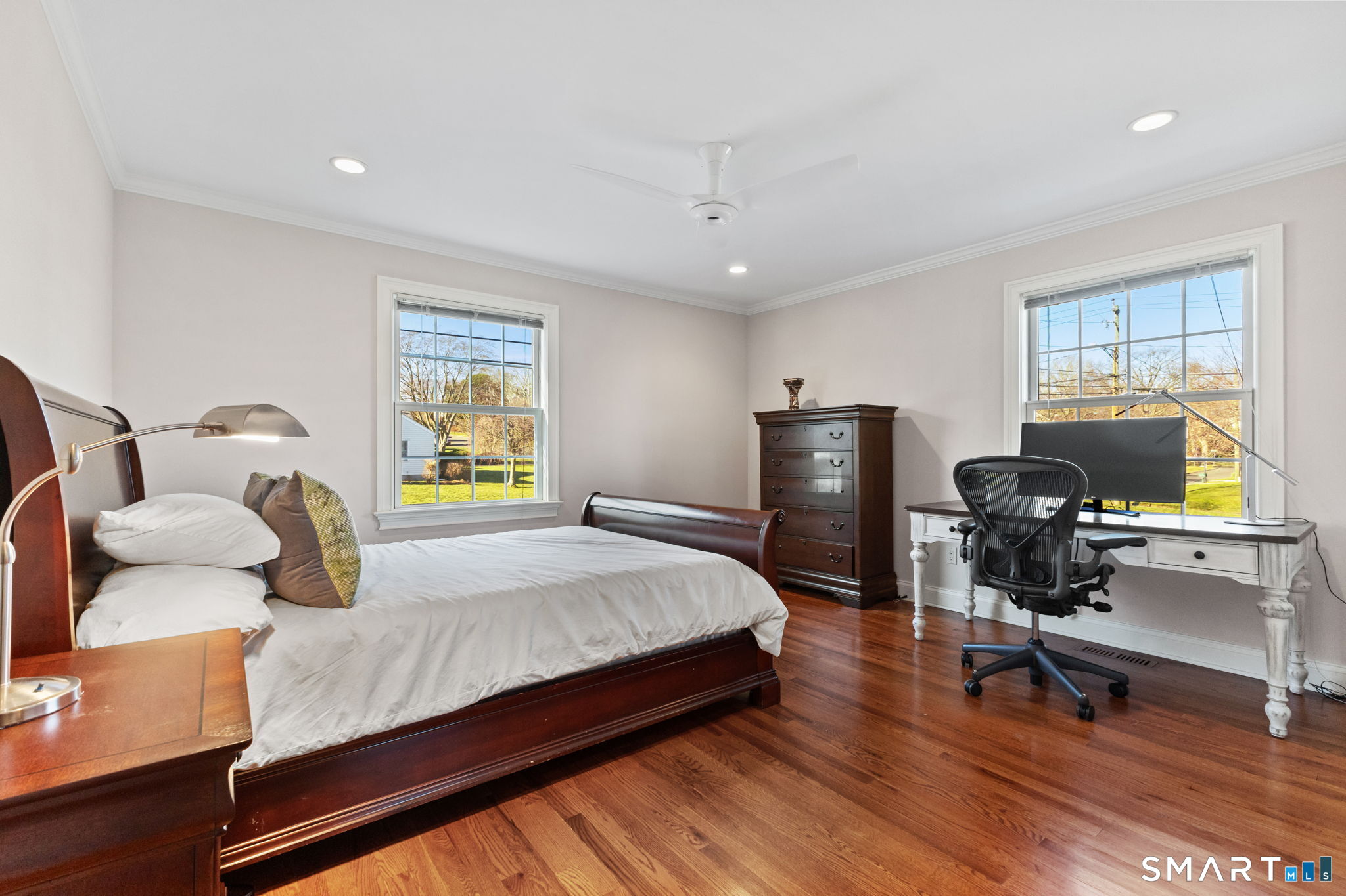 61 Hobson Street Stamford, CT 06902 - Photo 21 of 36 a bedroom with a bed and a desk