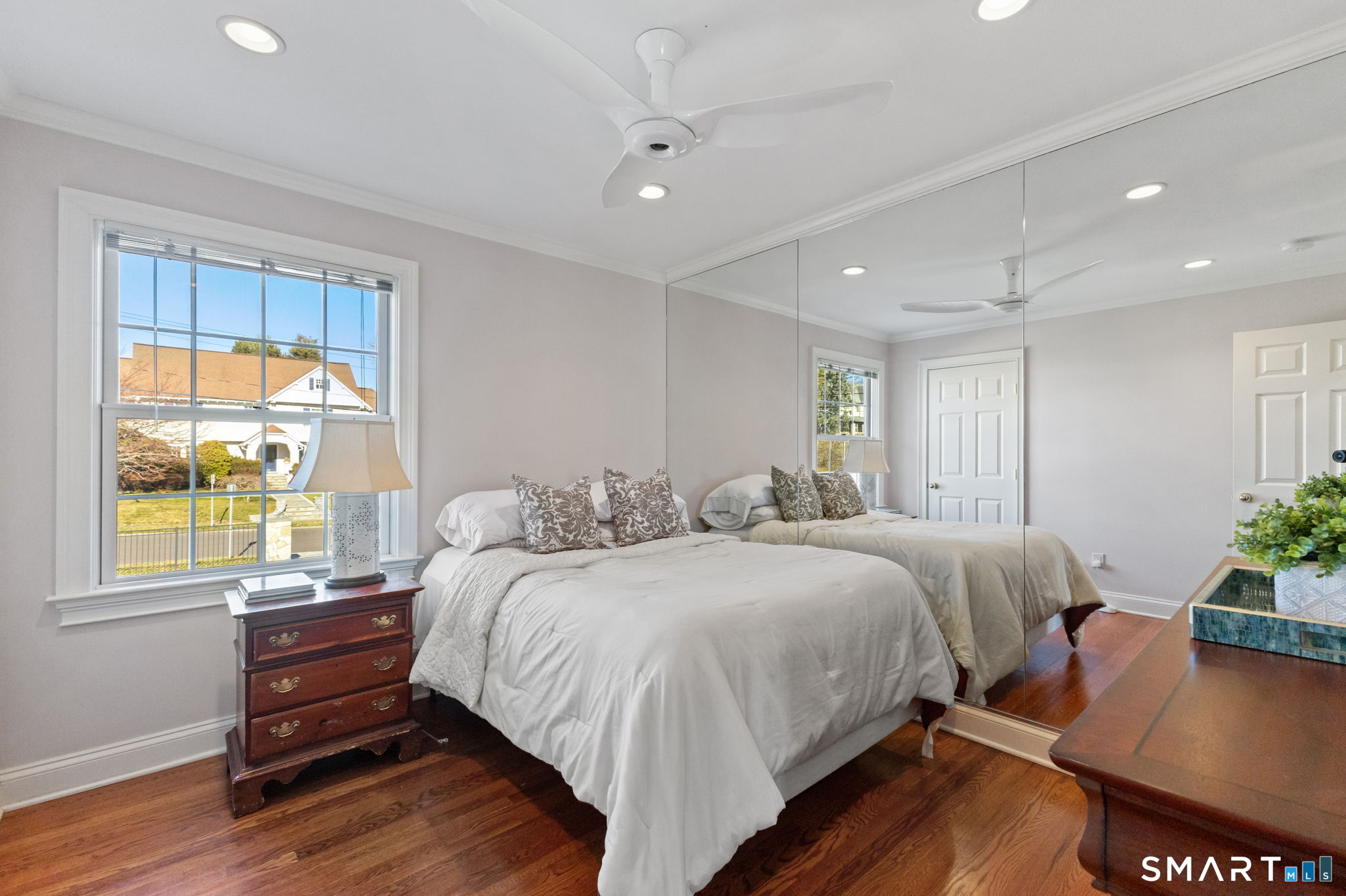 61 Hobson Street Stamford, CT 06902 - Photo 22 of 36 a bedroom with bed and window