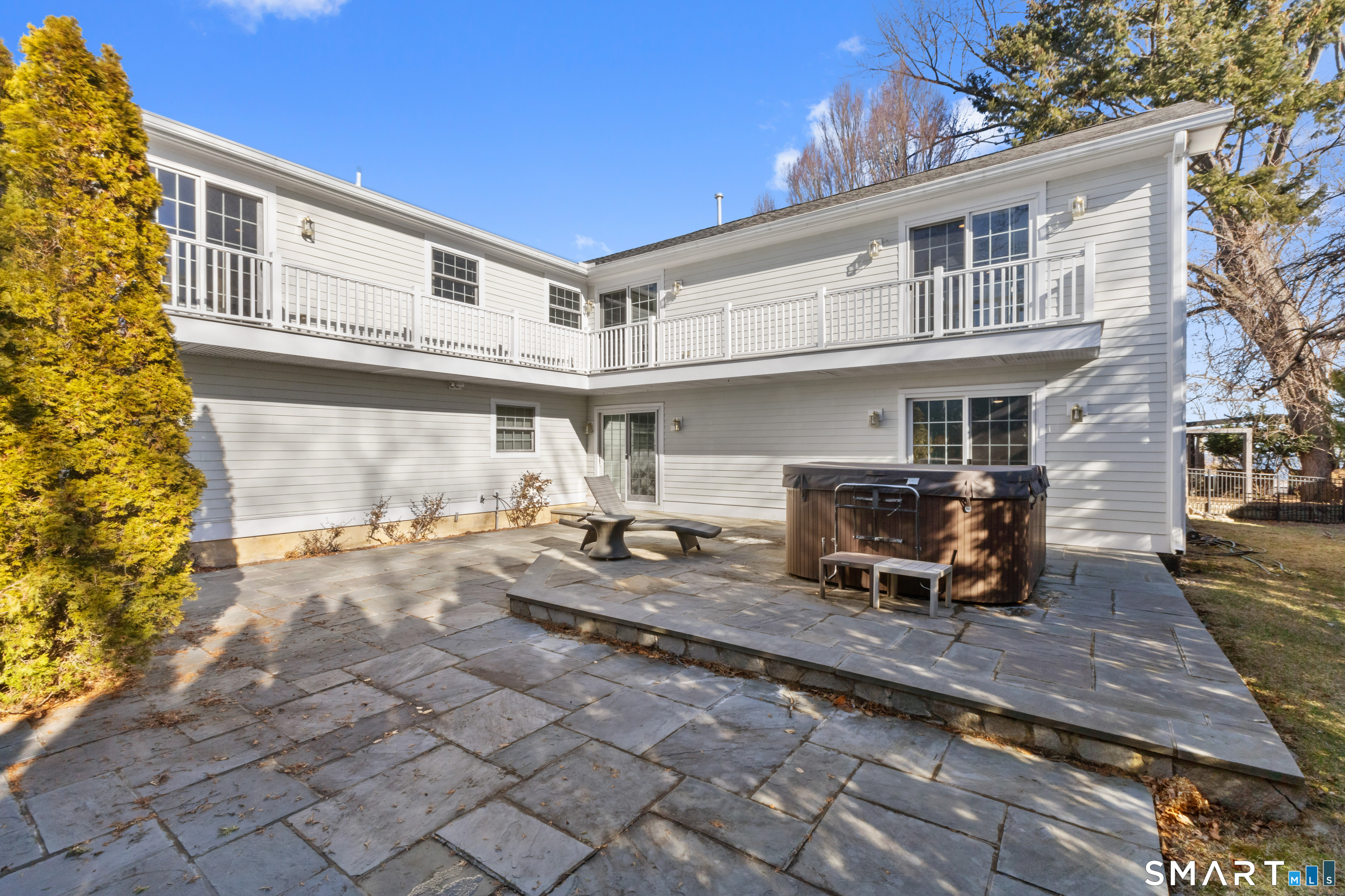 61 Hobson Street Stamford, CT 06902 - Photo 31 of 36 a view of a patio with table and chairs with wooden floor and plants