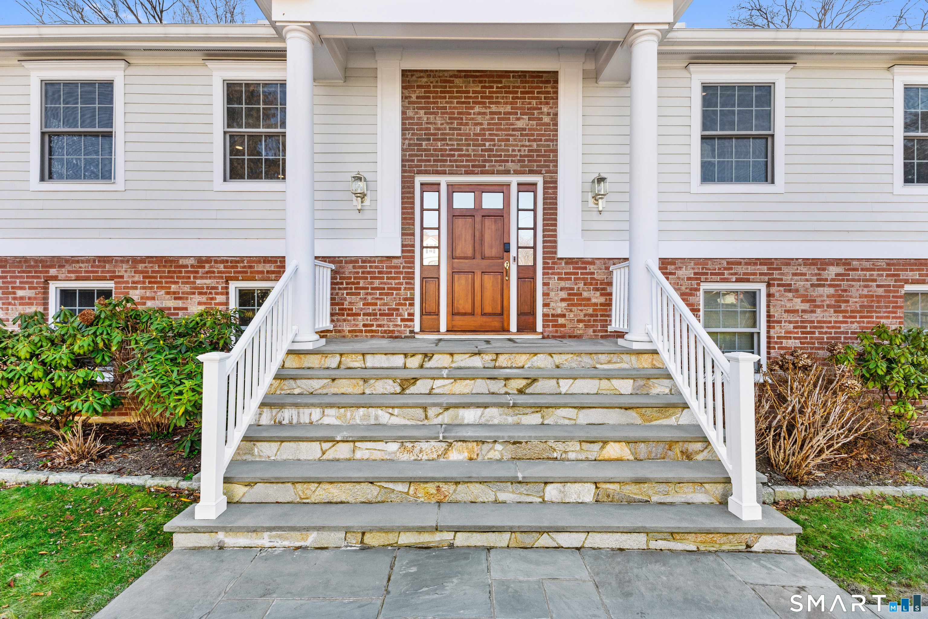 61 Hobson Street Stamford, CT 06902 - Photo 35 of 36 a front view of a house with entryway