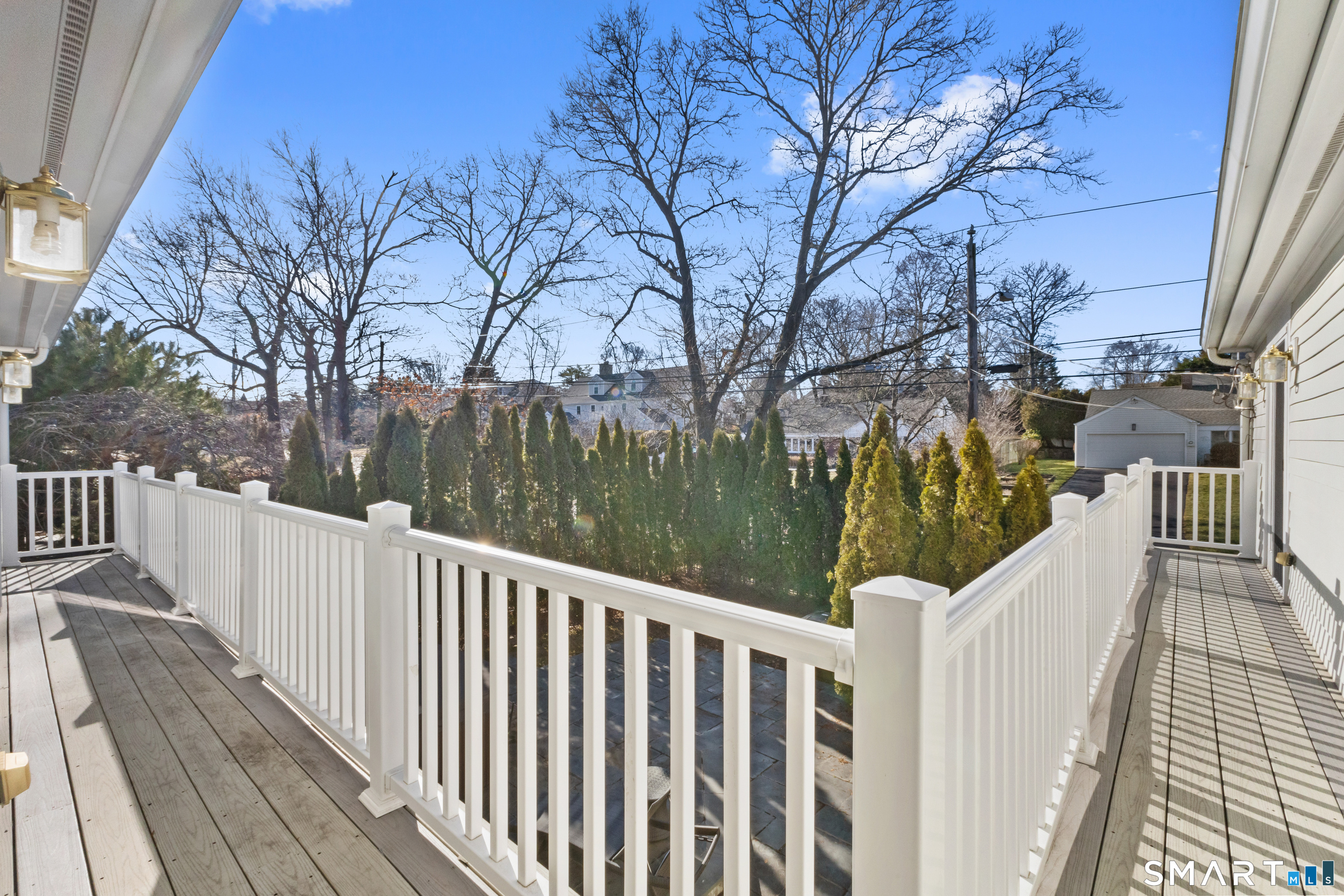 61 Hobson Street Stamford, CT 06902 - Photo 36 of 36 a view of a balcony with wooden fence and floor